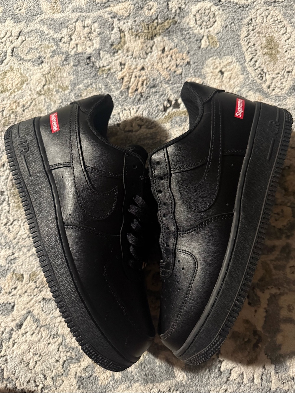 Nike Men’s Black Leather Low-Top Sneakers with Red Accent